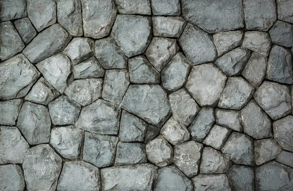Superficie del muro di pietra granito — Foto Stock