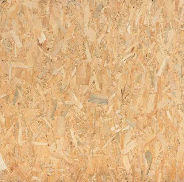 Pressed wooden panel background, seamless texture of oriented st — Stock Photo, Image