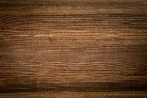 Υπόβαθρο της ξύλινης επιφάνειας καρυδιά — Φωτογραφία Αρχείου