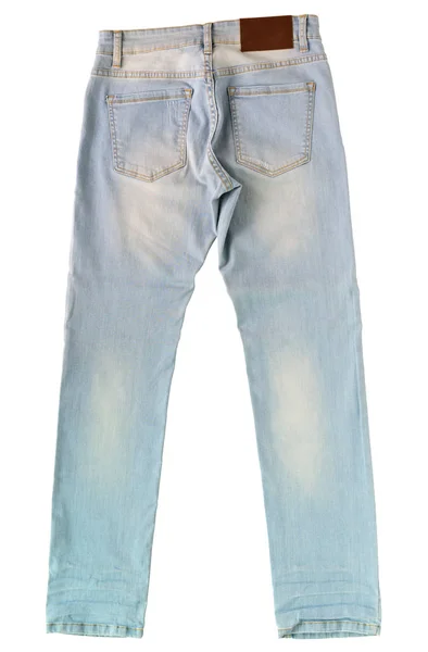 Jeans azul claro sobre fondo de piso — Foto de Stock