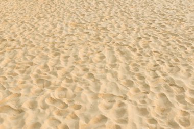 Yaz aylarında bir plajda kum desen doku