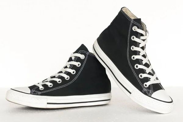 vintage style of sport black and white sneaker shoes on white ba