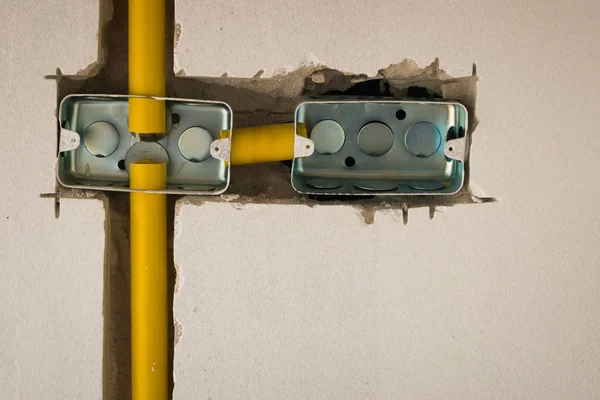 Two steel box electric socket installation inside masonry wall a — Stock Photo, Image