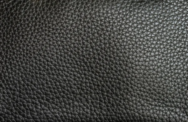 Hintergrund und Textur des echten schwarzen Lederbettes — Stockfoto