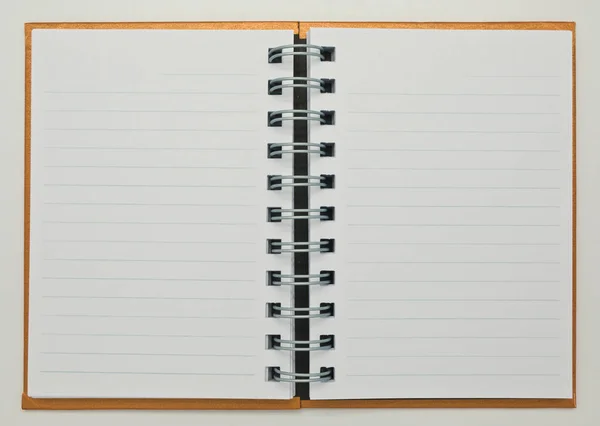 Open notebook on white background — Stock Photo, Image