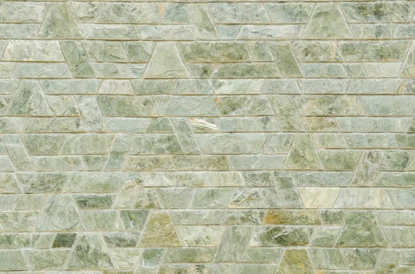 Візерунок зеленого шиферу кам'яна поверхня стіни — стокове фото