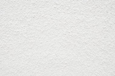 Dekoratif duvardaki beyaz kum spreyinin arkaplanı ve dokusu