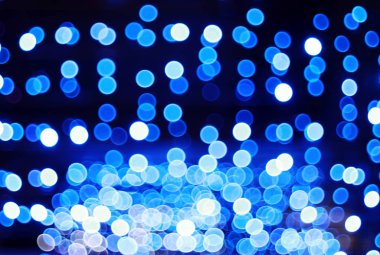 Gece şehir ışıkları bokeh arka plan. Ufuk bokeh ışıklar. Bulanık bokeh. Bokeh açık renkli. Soyut Mavi.