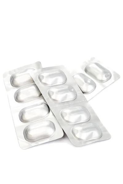 Pills in blister packs on white background. — Stock Photo, Image