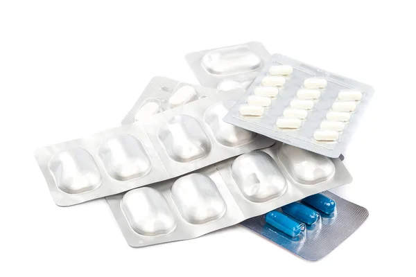 Χάπια σε συσκευασίες σε άσπρο φόντο. — Φωτογραφία Αρχείου