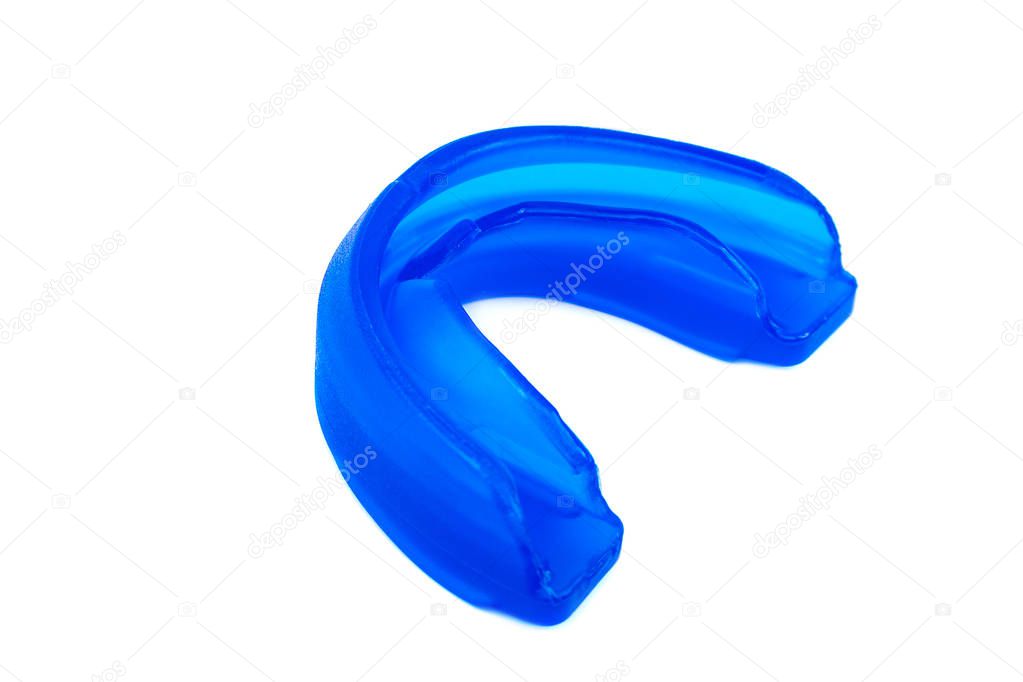 Blue mouthguard isolated on a white background.