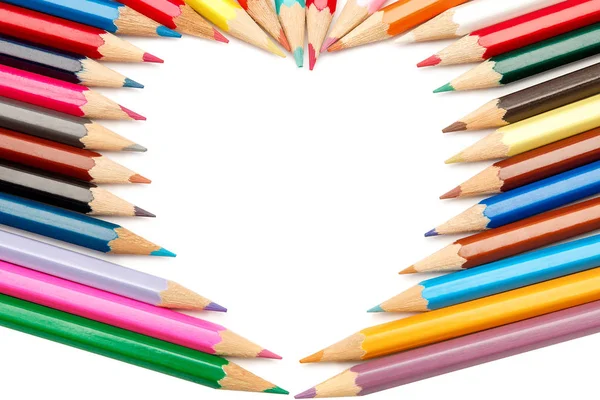 Heart of colored pencils on white background — Stock Photo, Image