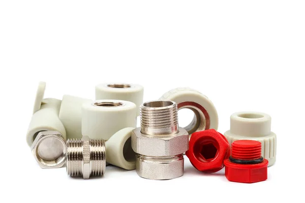 Set of metal-plastic plumbing couplings, adapters, plugs — Stock Photo, Image