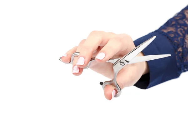 Professional hairdressing scissors in a female hand. — Stock Photo, Image