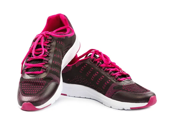 Κομψό ροζ αθλητικά παπούτσια που απομονώνονται σε λευκό φόντο — Φωτογραφία Αρχείου