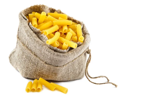 Macaroni in a bag on white background. — Stock Photo, Image