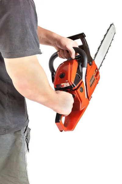 Chainsaw in a male hand isolated on a white background — Stock Photo, Image