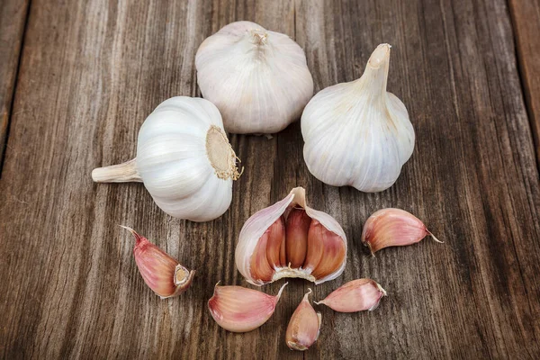 Fresh Garlic Wooden Background Royalty Free Stock Photos