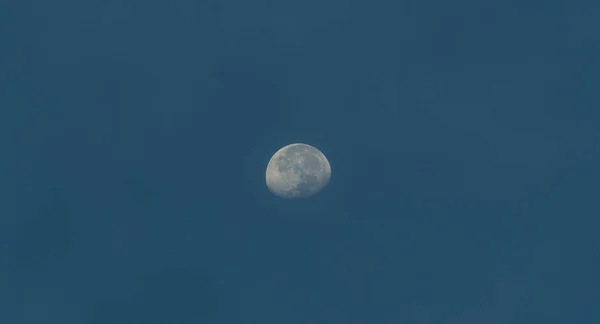the moon with blue sky