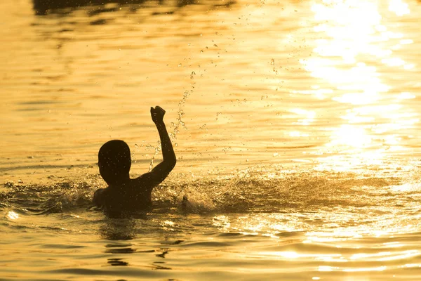 Child Swimming Sunset — Stock Photo, Image