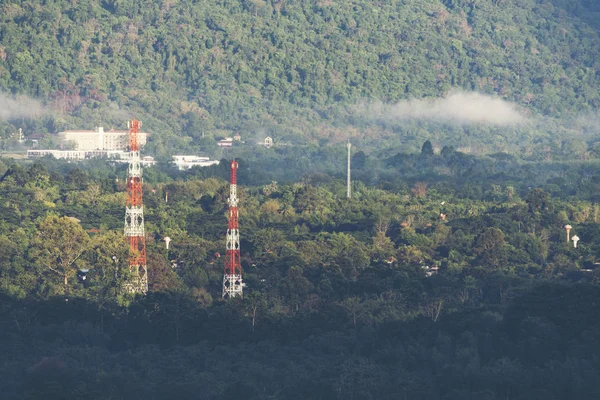 Telephone tower in the forest