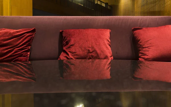 Luxury sofas in the hotel\'s guest lounge with night lighting.