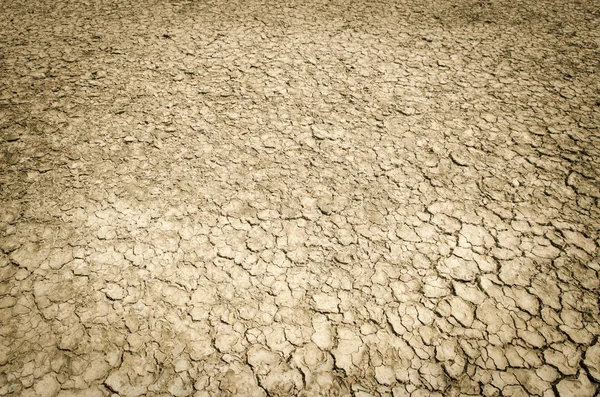 干燥的土壤干裂了地球纹理 — 图库照片