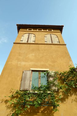 Italian style building on sky background