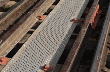 close up of railway tracks on the road 