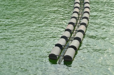 water tanks on the river