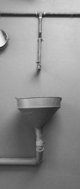 water pipe on grey wall