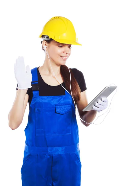 Femme constructeur dans l'uniforme avec une tablette — Photo