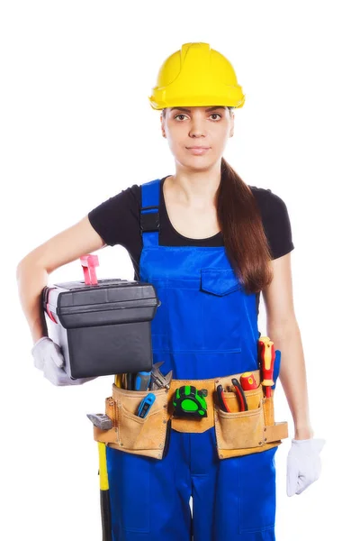 Женщина-строитель в форме с ящиком для инструментов — стоковое фото