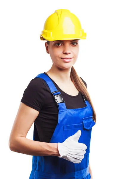 Bouwer van de vrouw in het uniform en bouw handschoenen — Stockfoto