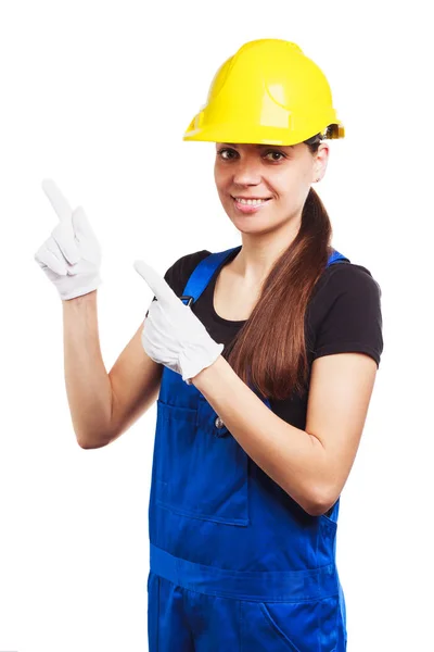 Bouwer van de vrouw in het uniform en bouw handschoenen — Stockfoto