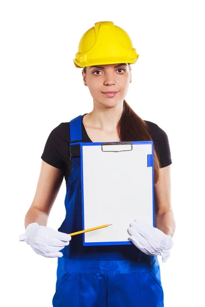 Женщина-строитель в форме с планшетом — стоковое фото