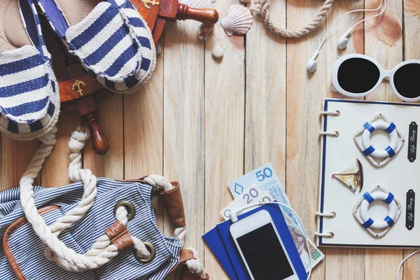 Striped espadrilles, money, passports and marine decorations — Stock Photo, Image