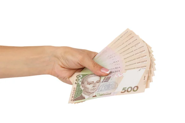 Kadın eli beş yüz hryvnias, izole banknotlar tutar