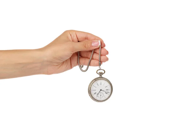 Рука жінки тримає кишеньковий годинник, ізольовані — стокове фото
