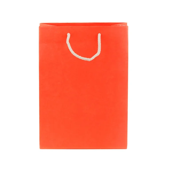 Oranžový balíček z papíru, izolované na bílém — Stock fotografie