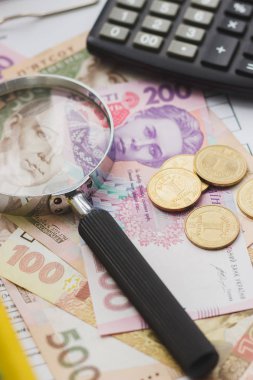 Temiz sigorta formu, Büyüteç ve para