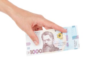 Elinde bir banknot ile 1000 hryvnia, izole edilmiş.