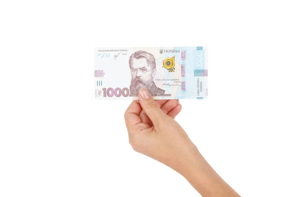 Elinde bir banknot ile 1000 hryvnia, izole edilmiş.