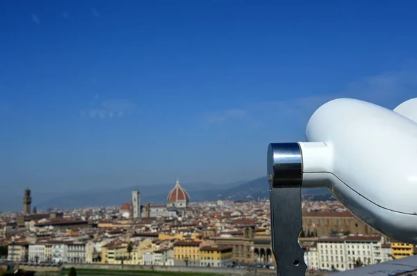 Binoculars with beautiful view of Florence city, Tuscany, Italy
