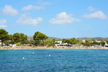 Spectacular view of Es Canar beach, Ibiza Island, beach with crystalline water, natural paradisiac scenery, Des Canar, Ibiza island, Spain, holidays summer 2016 clipart