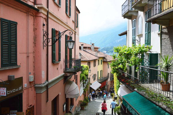 BELLAGIO, ITALY - MAY 14, 2017: tourists in Salita Serbelloni picturesque small town street view in Bellagio, Lake Como, Italy