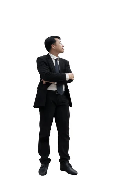 Fiducioso asiatico businessman standing e looking away su bianco — Foto Stock