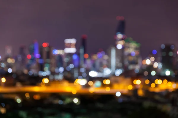 Abstrato desfocado bokeh negócio cityscape área à luz da noite — Fotografia de Stock