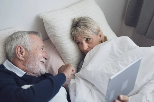 Happy elderly couple caucasian senior man watching sport, game, — Stock Photo, Image