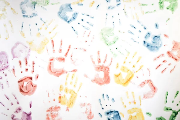 Children's art prints of hands on paper. — Stock Photo, Image